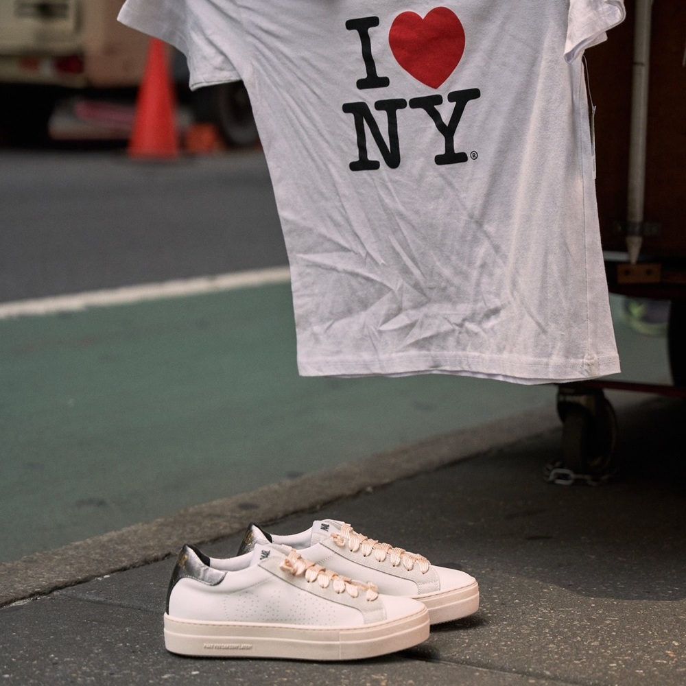 Classic Women's White Leather Sneakers with Metallic Accent - Picture 2 of 15